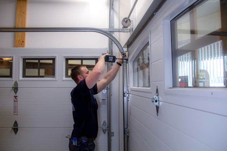 Professional garage door repair technician